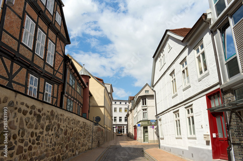 Fototapeta Naklejka Na Ścianę i Meble -  Historic Alley at the Historic City Centre of Schwerin, Mecklenburg-Vorpommern, Germany