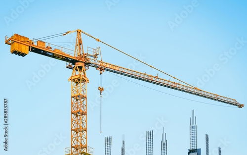 EU Lifting crane at development of modern skyscraper