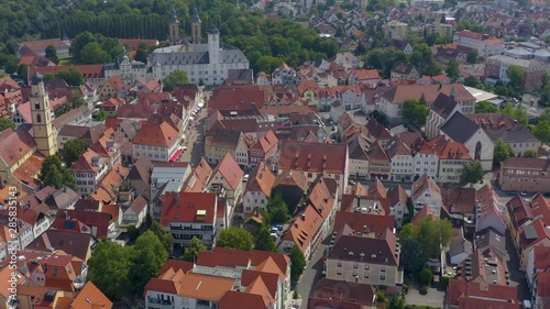 Aerial view from the old town of the city Bad Mergentheim. Slow pan to the reight around the town center with front view of the palace. photo