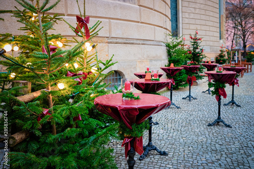 Decorated Christmas tree at Christmas market at Opera house Berlin photo