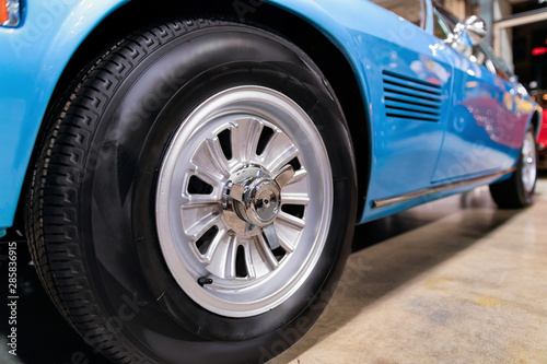 Wheel of blue vintage classic car auto