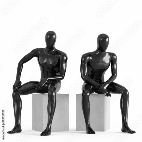 Two black plastic mannequins sit on white drawers. 3D