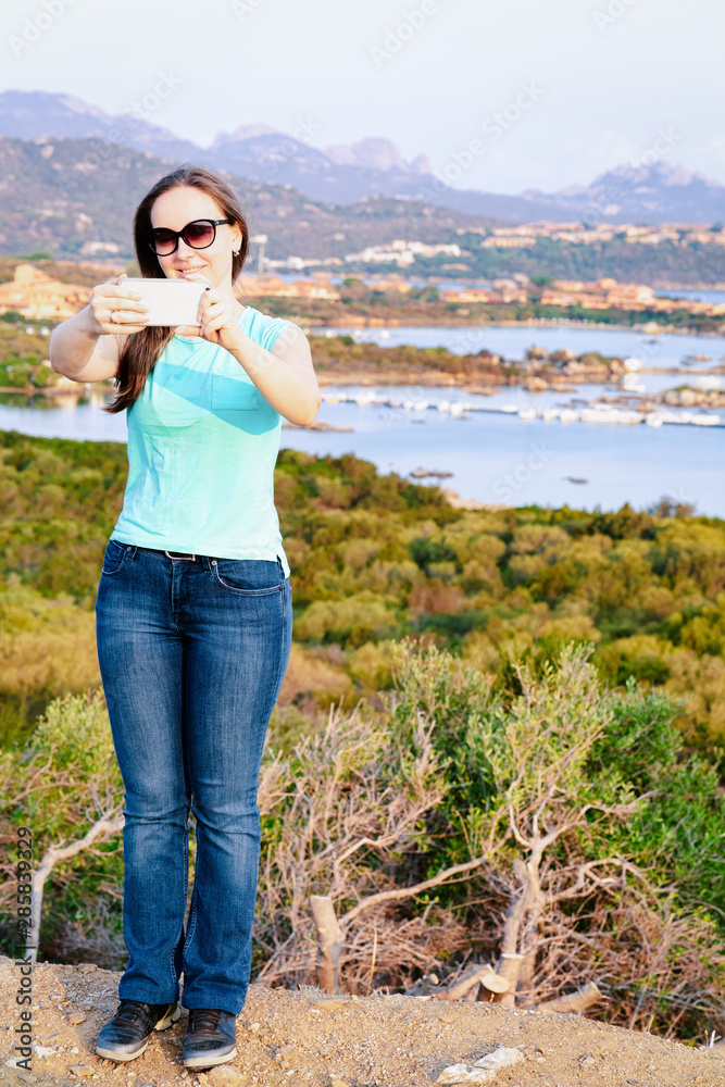 Sunrise or sunset and young girl at Golfo Aranci Sunrise or sunset and young girl at Golfo Aranci