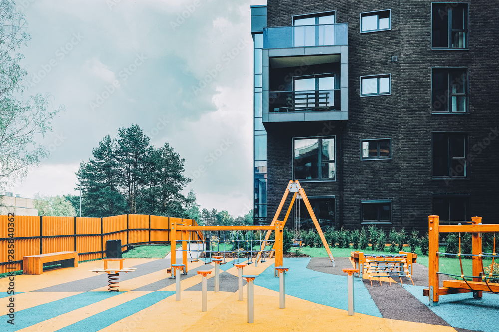 Children playground and modern residential buildings quarter Children playground and modern residential buildings quarter