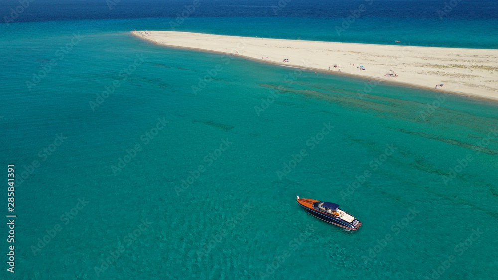 Aerial drone photo of iconic exotic sandy peninsula and sandy beach of Possidi with turquoise clear sea, Kassandra, Halkidiki, North Greece Aerial drone photo of iconic exotic sandy peninsula and sandy beach of Possidi with turquoise clear sea, Kassandra, Halkidiki, North Greece