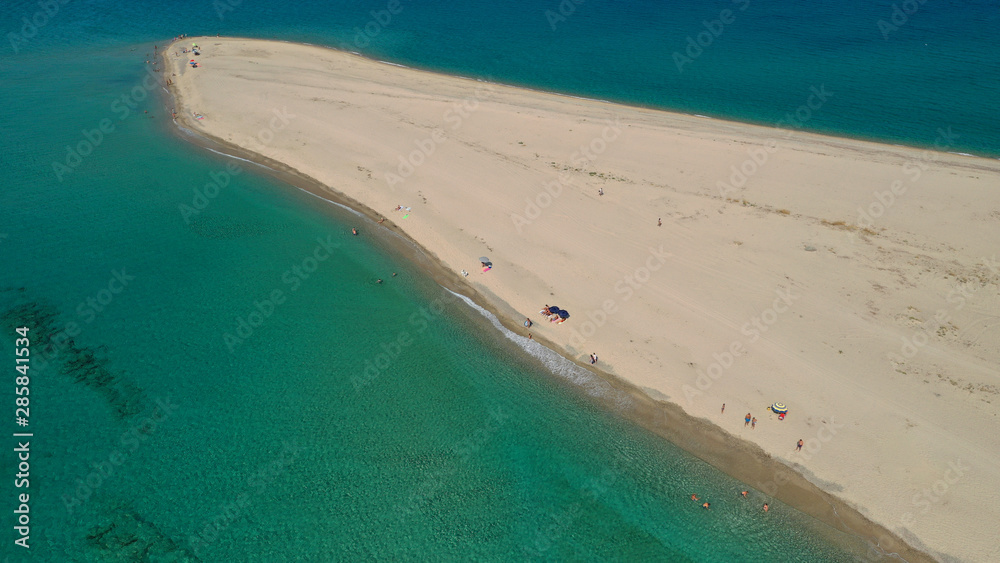 Aerial drone photo of iconic exotic sandy peninsula and sandy beach of Possidi with turquoise clear sea, Kassandra, Halkidiki, North Greece