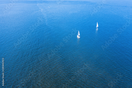 Two small sports yachts on the high seas aerial view