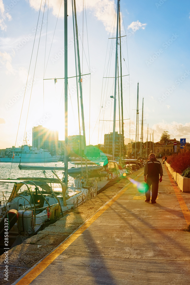 Naklejka premium Sunset at Harbor with Luxury ships of Olbia