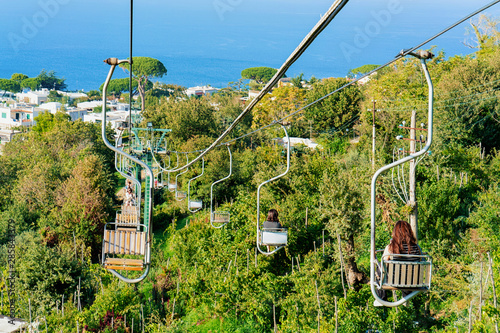 People on Chair lift in Capri Island town