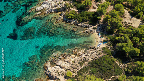 Fototapeta Naklejka Na Ścianę i Meble -  Aerial drone photo of iconic turquoise paradise rocky beach of Kavourotripes in Sithonia Peninsula, Halkidiki, North Greece