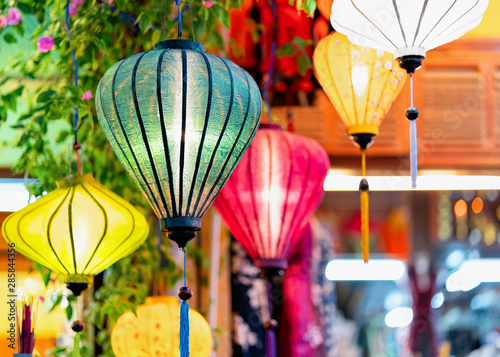 Colorful street lamps hanging at market in Hoi An