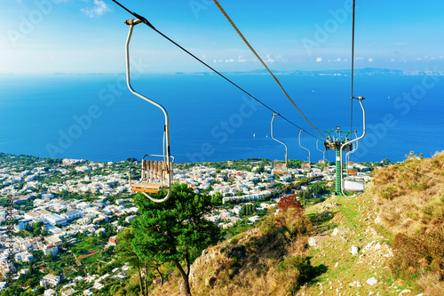 Chair lift in Capri Island town at Naples Italy photo