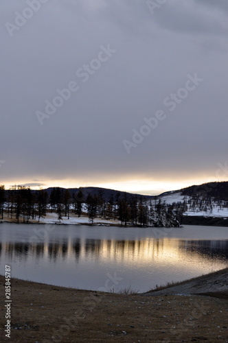 lake at sunset with reflection and snow (Lake Khuvsgul, Mongolia - Siberia) © Robert