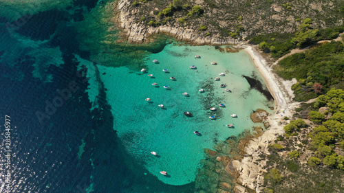 Aerial drone photo of iconic exotic sandy beach known as white beach in Diaporos island with turquoise clear sea, Vourvourou, Sithonia Peninsula, Halkidiki, North Greece