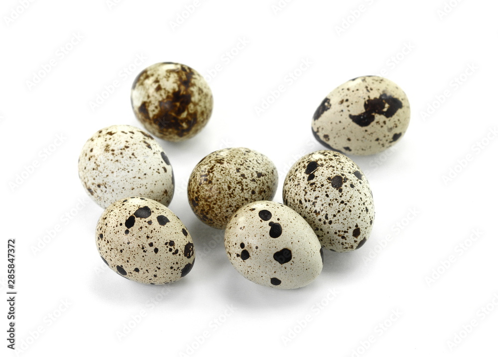 Quail eggs isolated on white background.