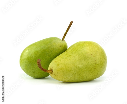 Green organic pears on white background