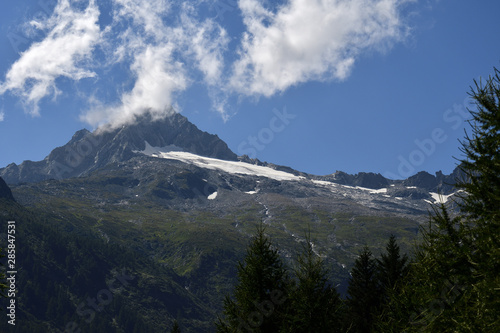 Cima Vazzeda and Cima di rosso mountain with its hanging glacier in summer