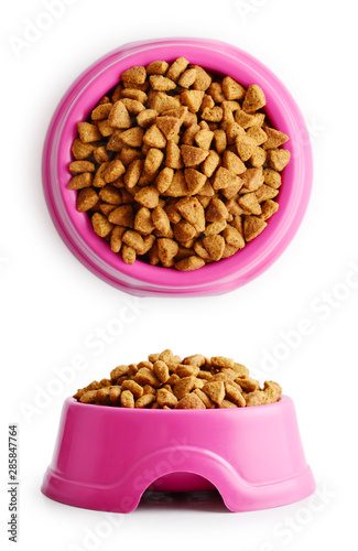 Dry cat food in pink bowl