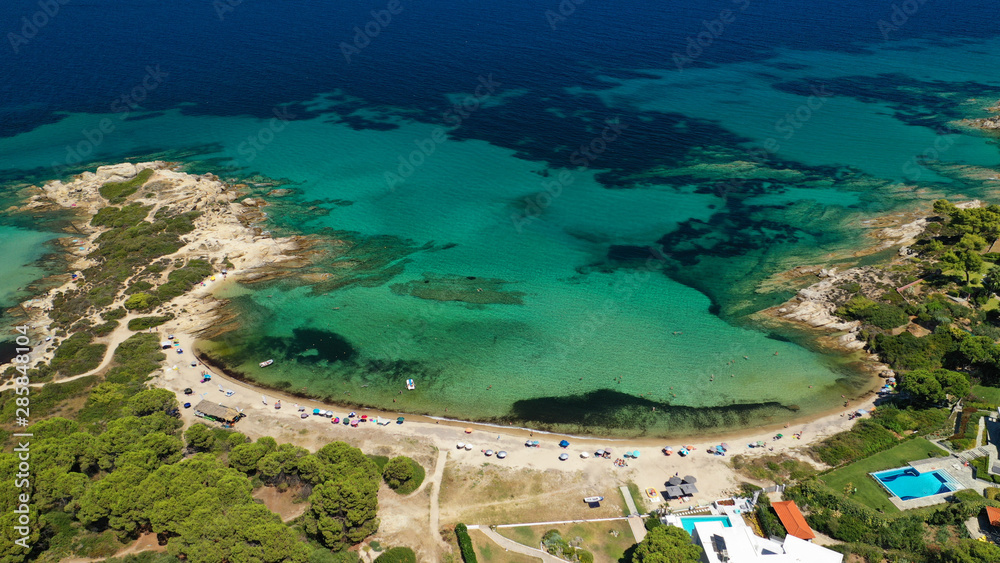 Aerial drone photo of turquoise bay near famous Vourvourou and Diaporos island, Sithonia peninsula, Halkidiki, North Greece