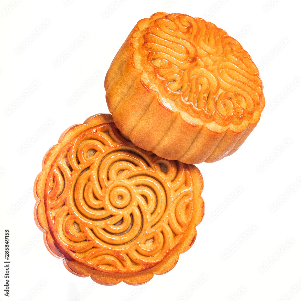 Two Chinese mooncake isolated on white background by top view. Two Chinese mooncake isolated on white background by top view.