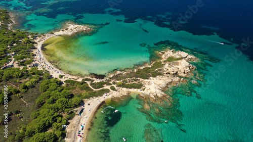 Aerial drone photo of iconic turquoise paradise sandy twin beaches of Karidi in Sithonia Peninsula, Vourvourou bay, Halkidiki, North Greece