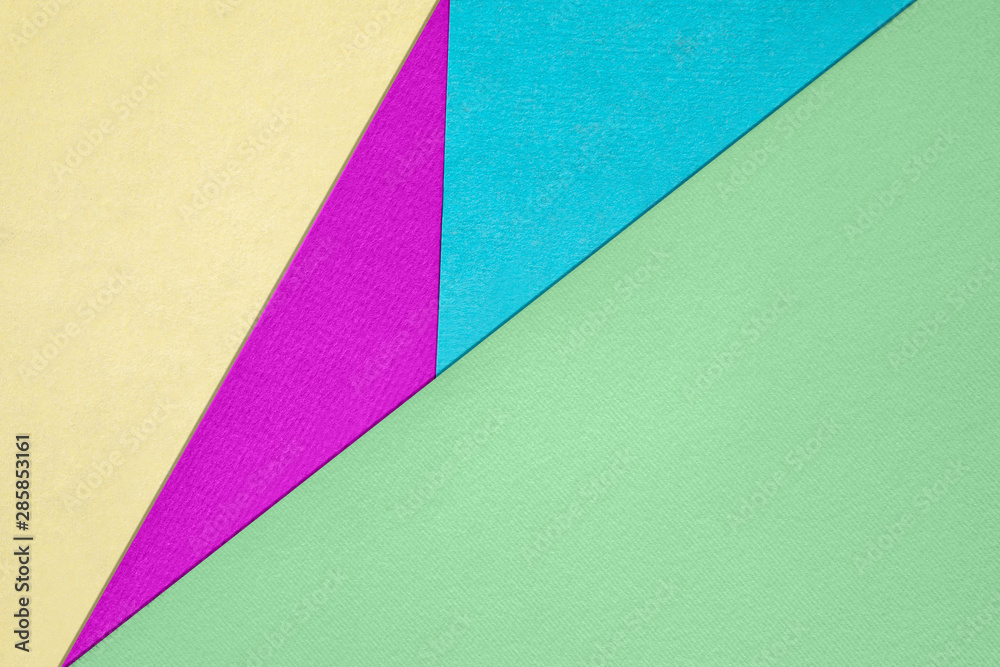 Abstract different bright colored paper backgrounds with place for text. Diagonal geometric composition. Top view. Abstract different bright colored paper backgrounds with place for text. Diagonal geometric composition. Top view.