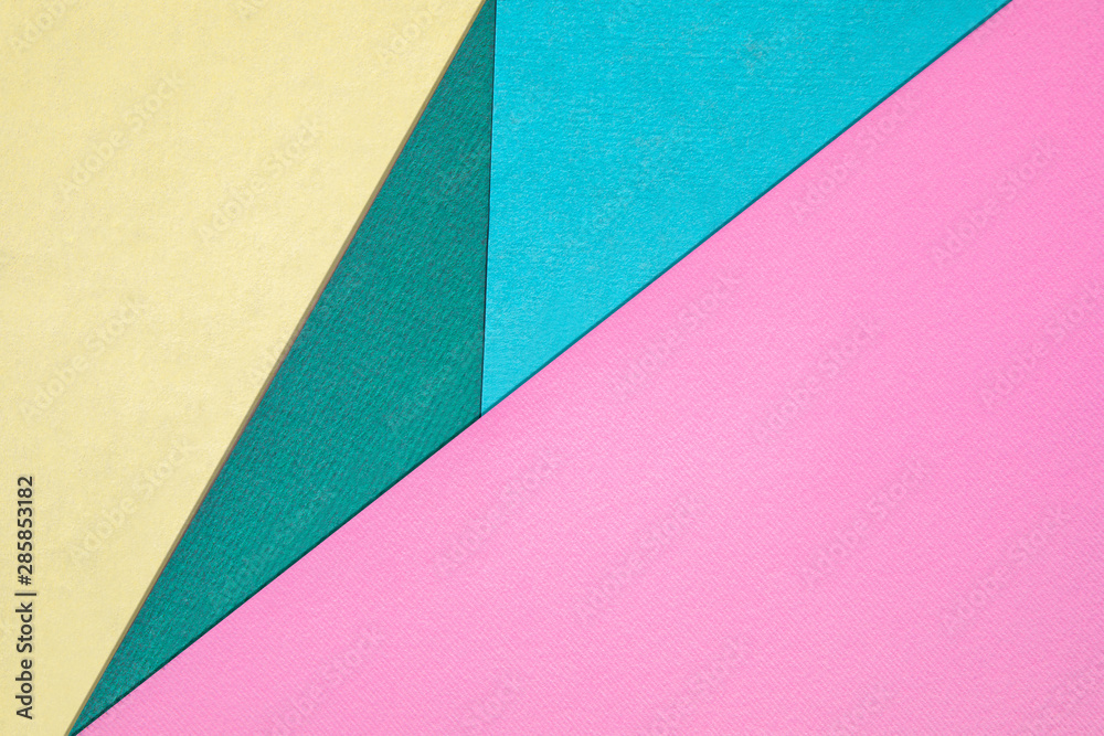 Abstract different pastel colored paper backgrounds with place for text. Diagonal geometric composition. Top view. Abstract different pastel colored paper backgrounds with place for text. Diagonal geometric composition. Top view.