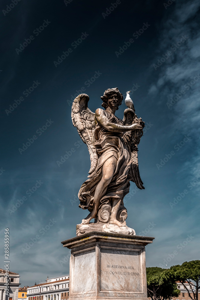 Ancient angel sculpture in Rome, Italy Ancient angel sculpture in Rome, Italy