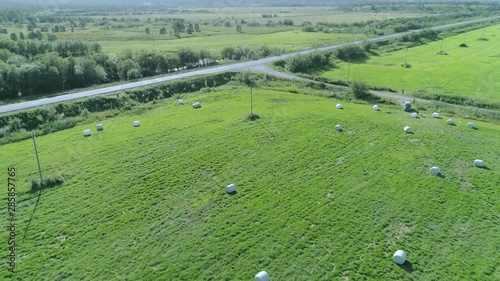 Drone  conducts  video shooting on agricultural fields where I harvest hay.