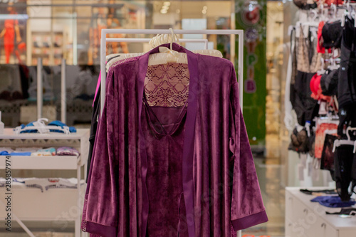 Foto Female red satin nightgown at the store
