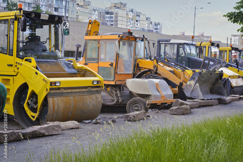 Heavy equipment for road repair. Road repair. Asphalt road paving. Kyiv. Ukraine.
