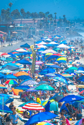 Hundreds of colored umbrellas at the beach