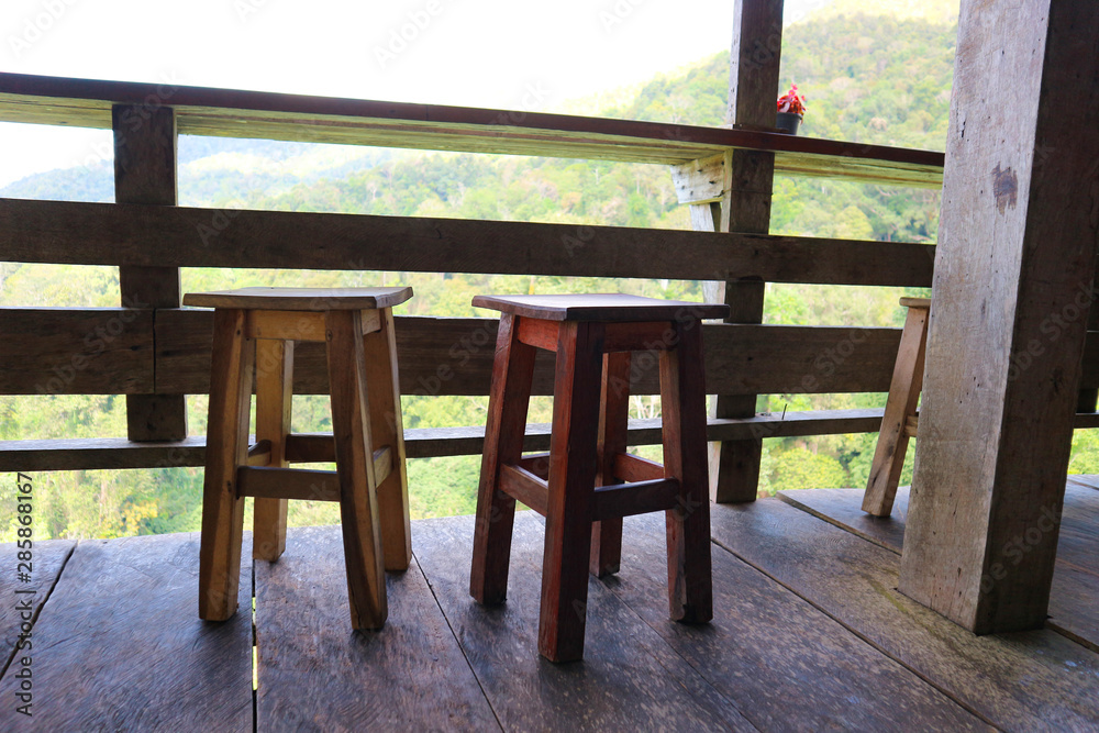 Wood chair on balcony for seeing mountain vies