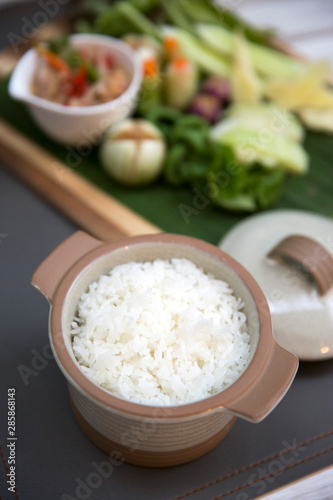Steamed rice in pot serve on table