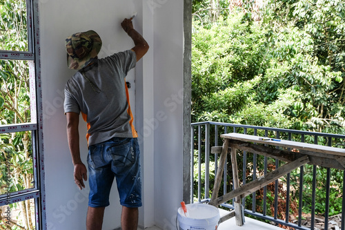 Men color paint in modern house renovte concept