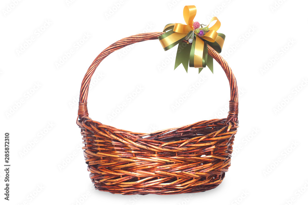 Empty wicket basket with bow isolate on white background