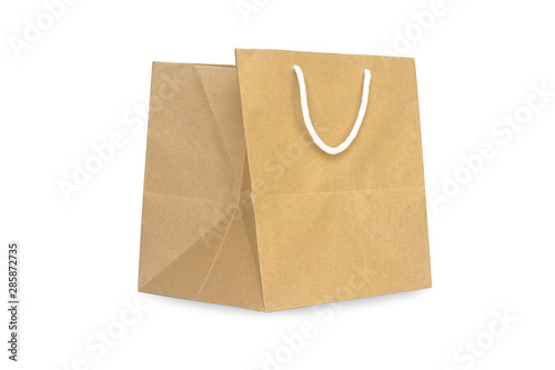 Brown paper shopping bag isolate on white background