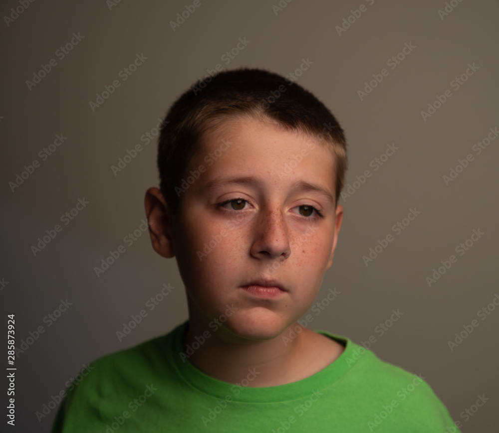 Portrait of an annoyed boy. Negative attitude concept. Portrait of an annoyed boy. Negative attitude concept.