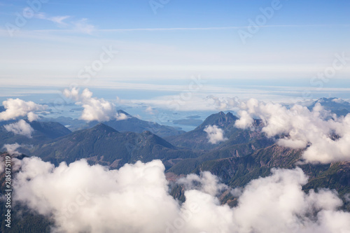 Aerial Landscape View of Beautiful Coastal Mountains on the Pacific Ocean Coast during a sunny summer morning. Taken near Tofino and Ucluelet, Vancouver Island, British Columbia, Canada. © edb3_16