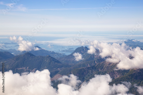 Aerial Landscape View of Beautiful Coastal Mountains on the Pacific Ocean Coast during a sunny summer morning. Taken near Tofino and Ucluelet  Vancouver Island  British Columbia  Canada.