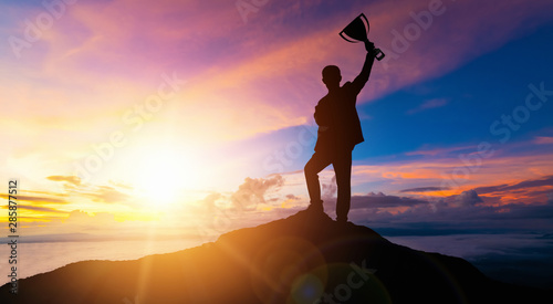 Achievement and Business Goal Success Concept - Creative business people with icon graphic interface showing employee reward giving for business success achievement. photo