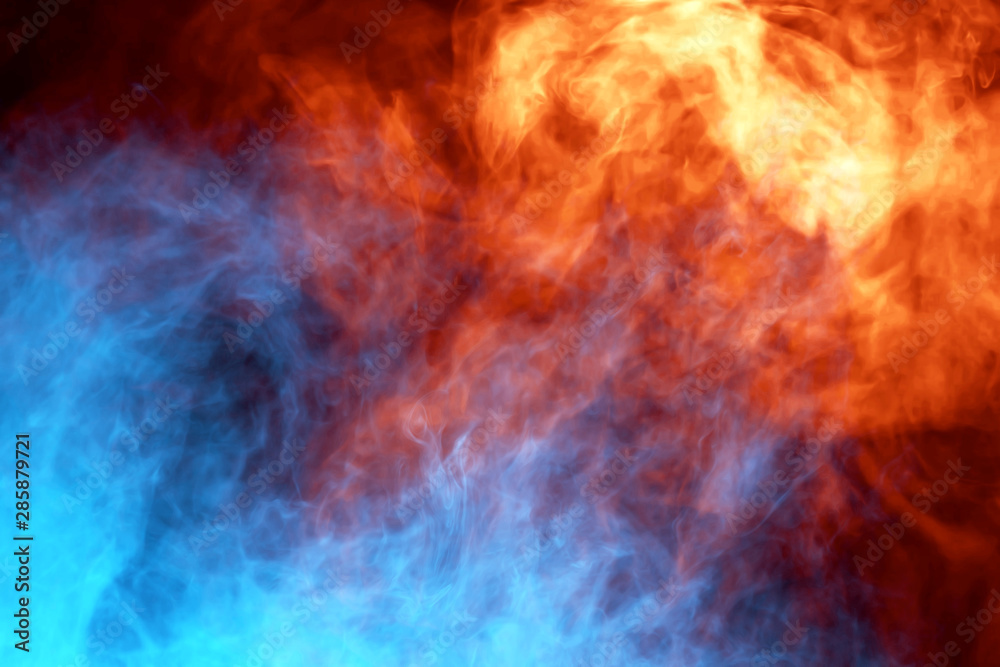 Fototapeta premium Abstract art colored smoke on black isolated background
