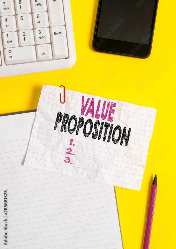 Text sign showing Value Proposition. Business photo text feature intended to make a company or product attractive Crumpled white paper on table with paper clips clock mobile and pc keyboard Text sign showing Value Proposition. Business photo text feature intended to make a company or product attractive Crumpled white paper on table with paper clips clock mobile and pc keyboard