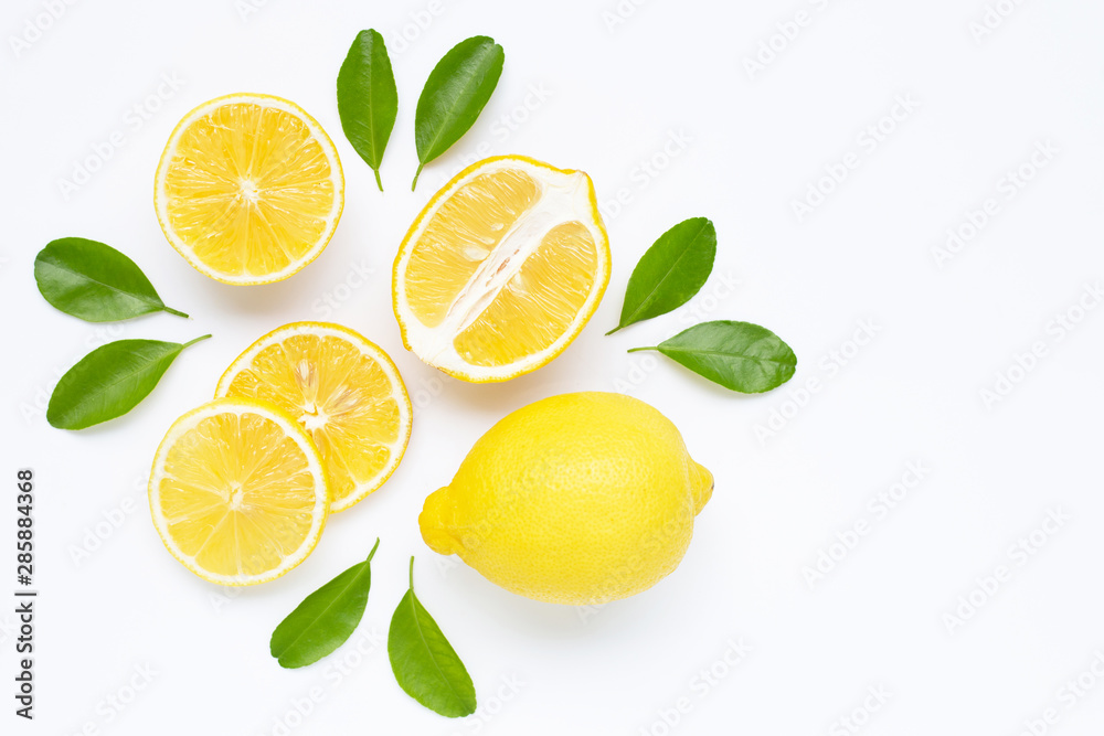 lemon and slices with leaves isolated on white.