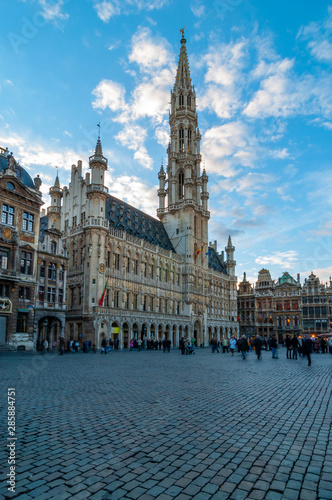 Long exposure of the majestic Grand Place main square in Brussels with the city hall and blurred motion of people, Belgium. © SL-Photography