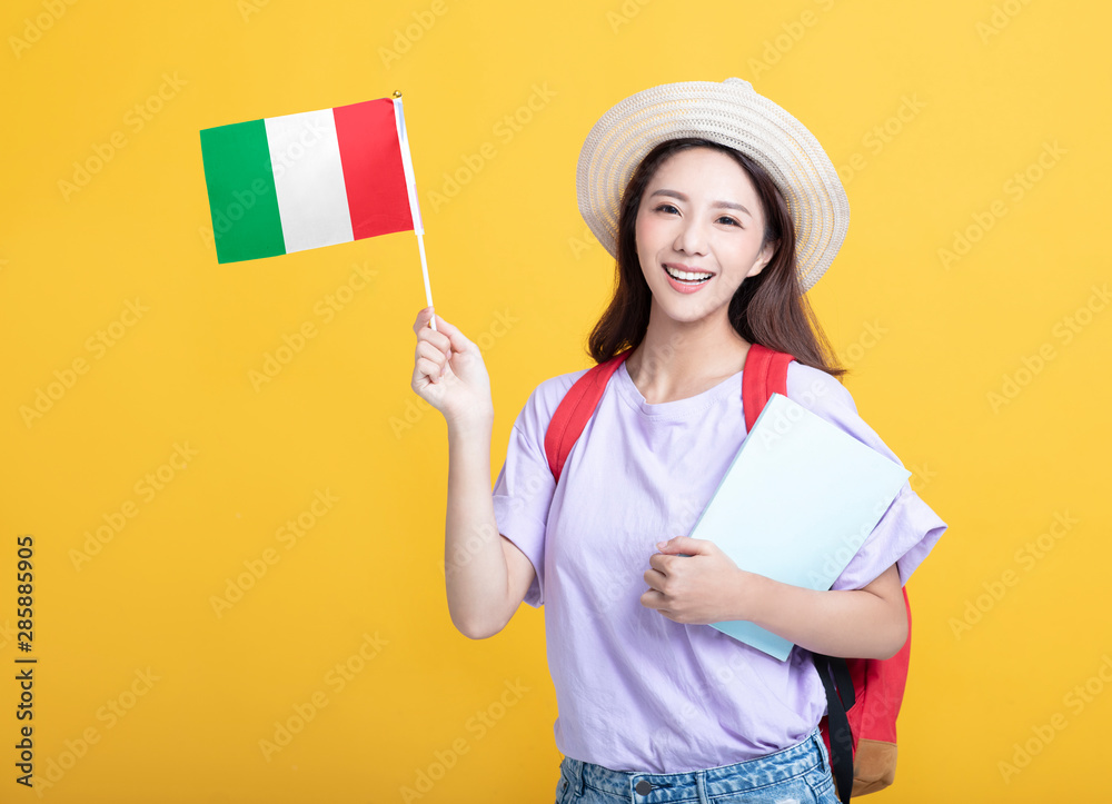 Young asian girl student showing the Italy flag Young asian girl student showing the Italy flag