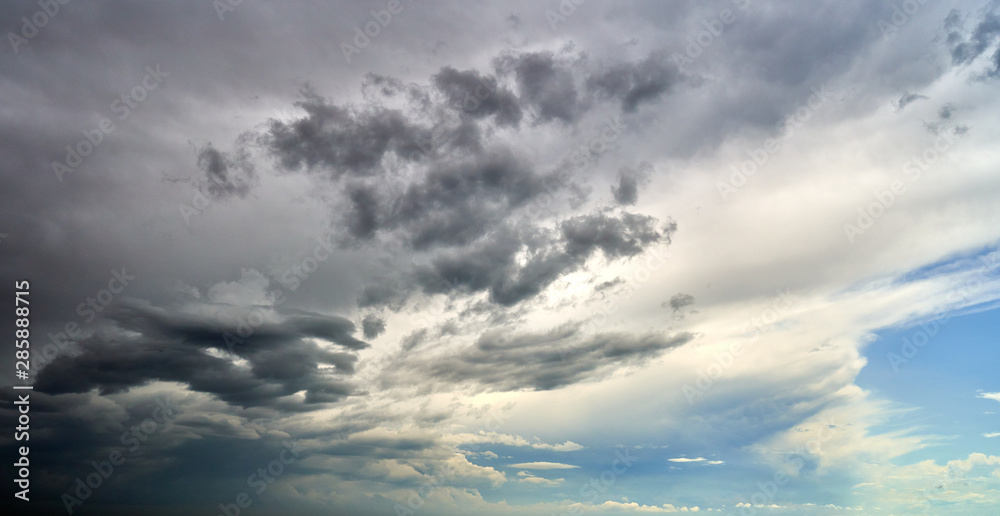 white thunderclouds floating across the sky white thunderclouds floating across the sky