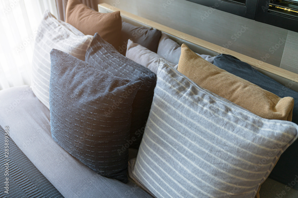 close up white beige soft pillows on bed and blanket bedroom interior design concept.bed maid luxury ideas concept