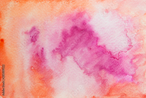 Hand painting pink and orange watercolor on paper background. © prasith