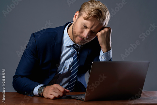 bad feeling woth overwork caucasian businessman hand touch part of body hurt and painful emotion ooffice syndrome ideas concept photo